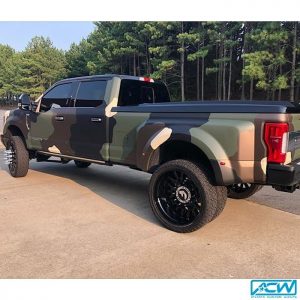 Ford F350 wrapped in M Matte Deep Black, Matte Military Green, Matte Brown Metallic, and Gloss Ivory with 8520 Matte Overlaminate vinyls