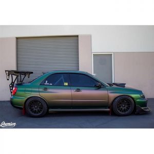 Subaru WRX wrapped in Avery Satin Urban Jungle Silver/Green/Purple shade shifting vinyl