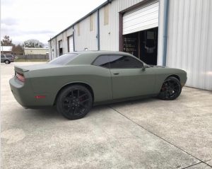 Dodge Challenger wrapped in Matte Military Green vinyl