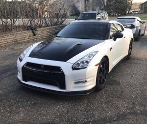 Nissan GTR wrapped in Satin White and Gloss Black vinyls