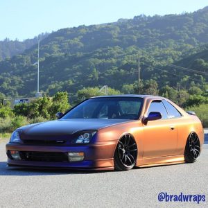 Honda Prelude wrapped in Avery ColorFlow Satin Roaring Thunder Blue/Red shade shifting vinyl