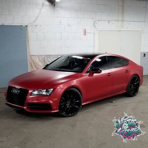 Audi A7 wrapped in 3M 1080 Satin Vampire Red and Gloss Black vinyls