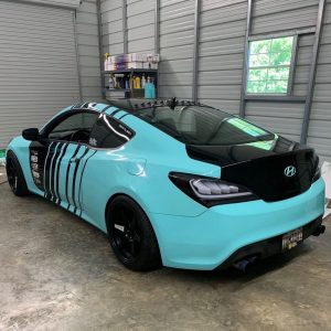 Hyundai wrapped in Gloss Mint Blue vinyl