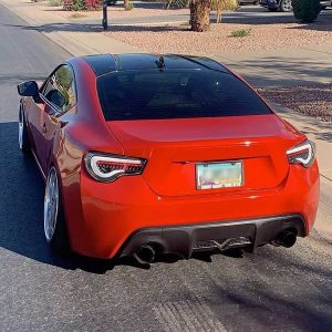 Subaru Brz wrapped in 3M 1080 Gloss Dragon Fire Red vinyl