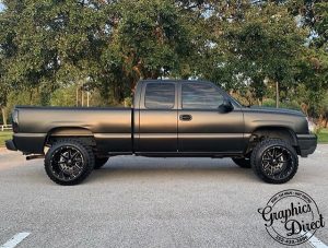 Chevrolet Silverado wrapped in 3M 1080 Satin Gold Dust Black and Matte Deep Black vinyl