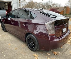 Toyota Prius wrapped in Gloss Black Rose vinyl