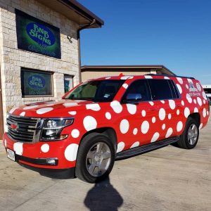 Chevrolet wrapped in Gloss Racing Red & Gloss White vinyl