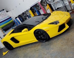 Lamborghini Huracan wrapped in Gloss Bright Yellow vinyl