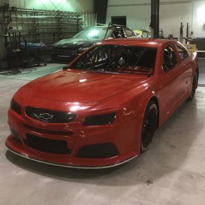 Chevrolet wrapped in Gloss Racing Red vinyl